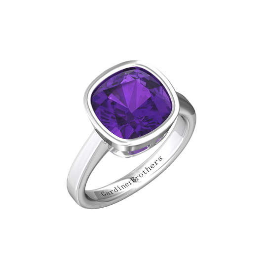 Nova cushion shaped Amethyst ring set in a plain bezel setting Gardiner Brothers White Gold