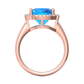 Nova cushion shaped Swiss Blue Topaz ring with a halo of diamonds Gardiner Brothers