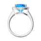 Nova cushion shaped Swiss Blue Topaz ring with a halo of diamonds Gardiner Brothers