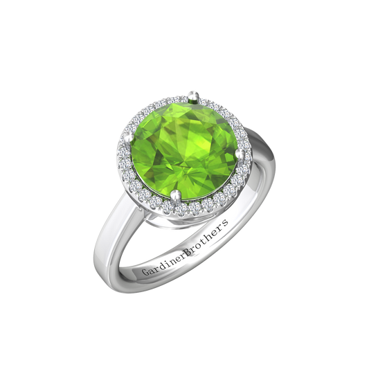 Nova round Peridot ring with a halo of diamonds Gardiner Brothers White Gold