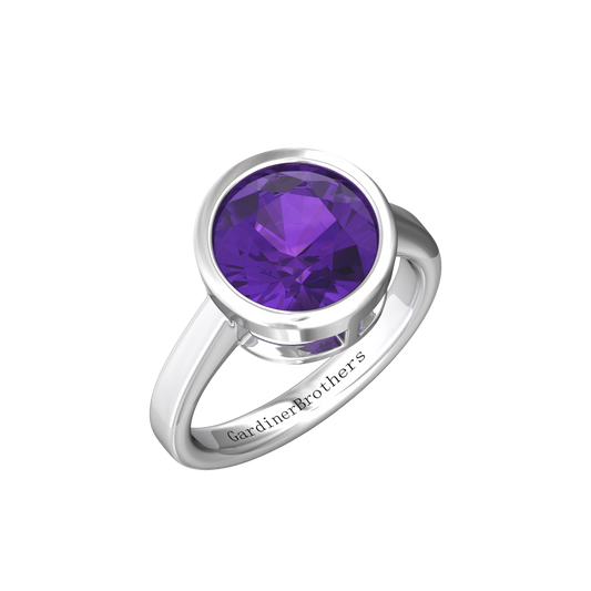 Nova round Amethyst ring set in a plain bezel setting Gardiner Brothers White Gold