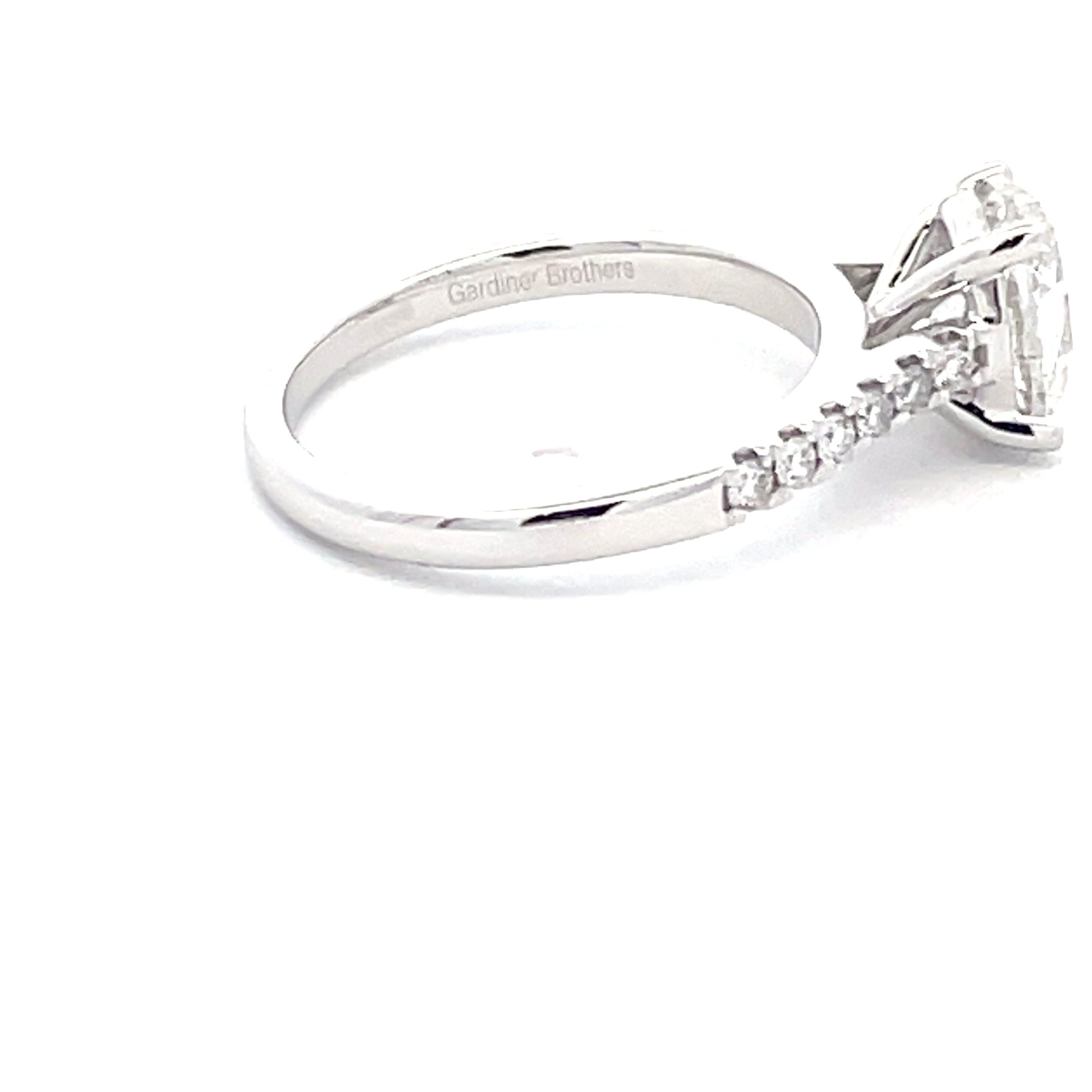 Oval Shaped Diamond Solitaire ring with diamond set shoulders - 1.76cts  Gardiner Brothers   