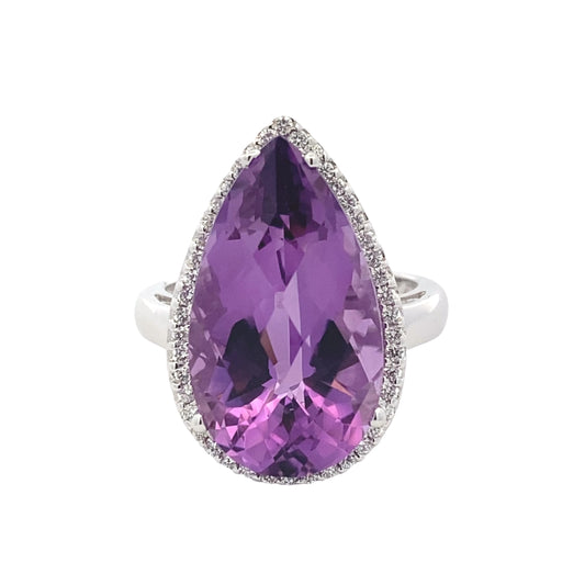 Pear Shaped Amethyst and Round Brilliant Cut Diamond Halo Ring Gardiner Brothers