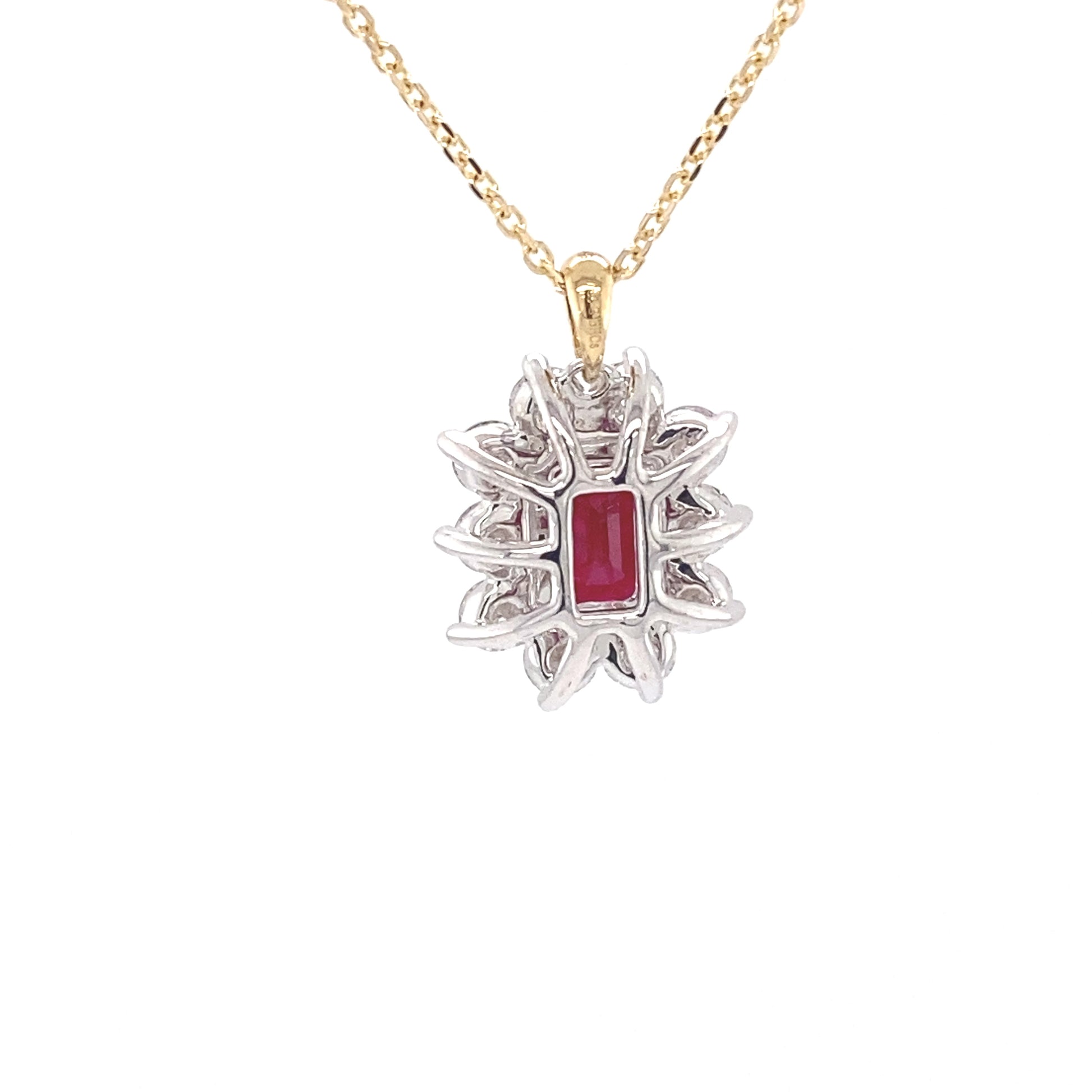 Octagonal Ruby and round brilliant cut diamond cluster pendant  Gardiner Brothers   