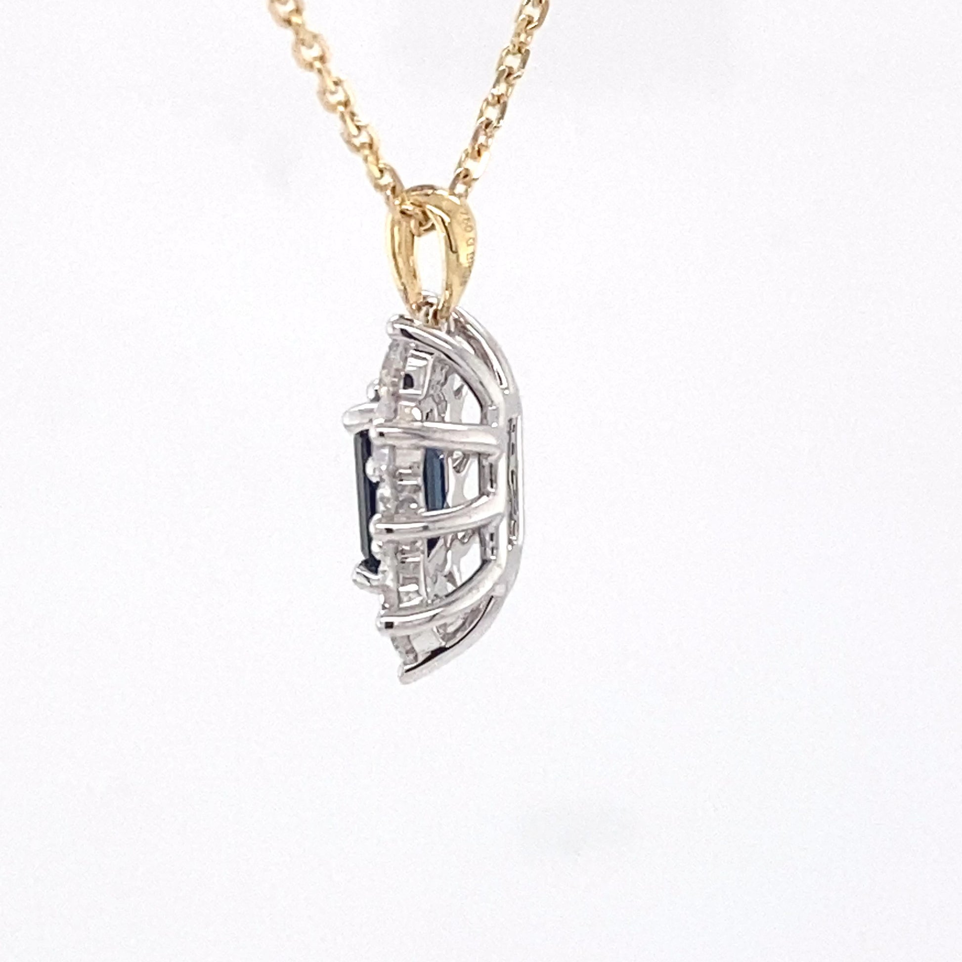 Octagonal sapphire and round brilliant cut diamond cluster pendant  Gardiner Brothers   