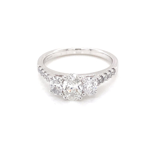 Oval shaped diamond 3 stone ring with diamond set shoulders - 1.10cts  Gardiner Brothers   