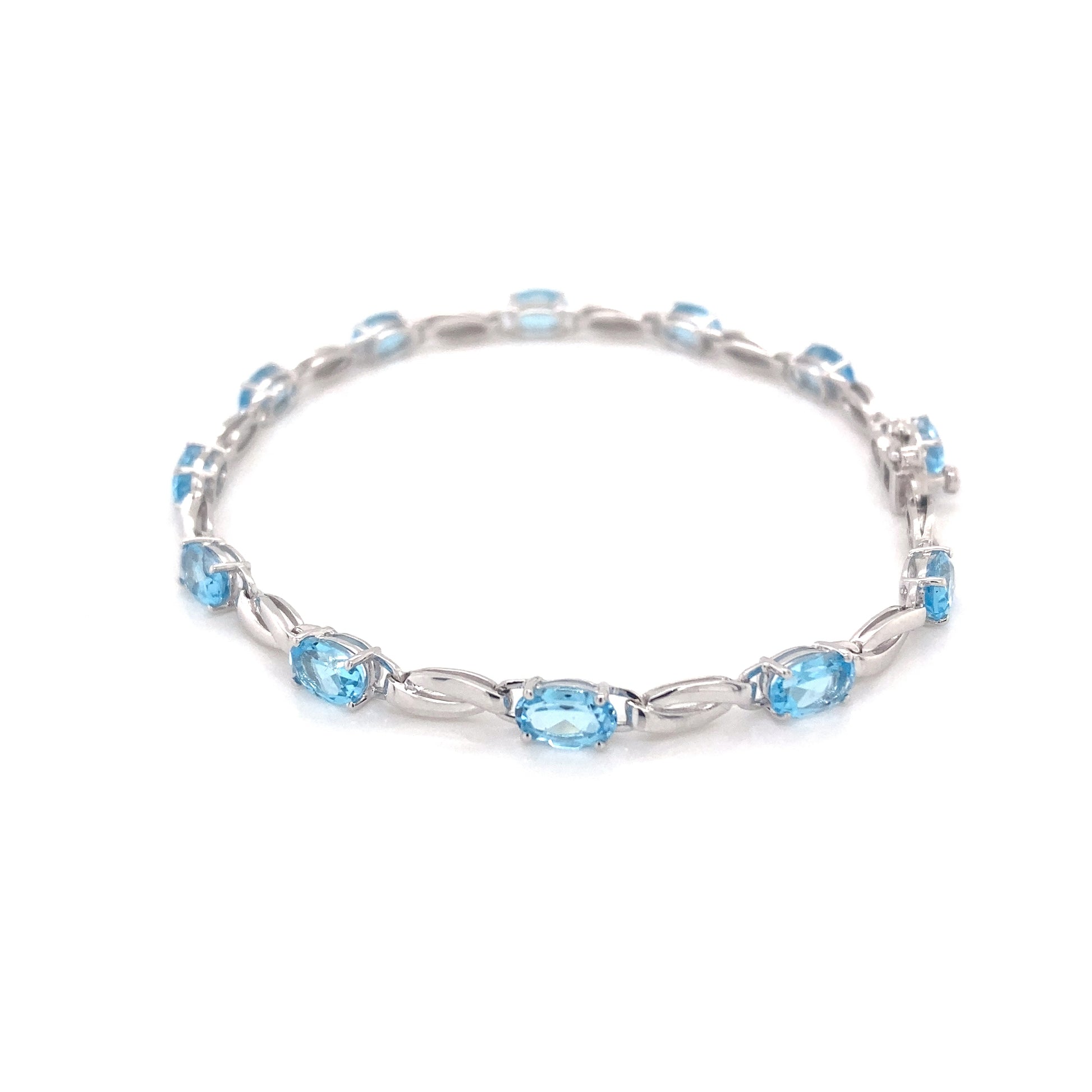 Swiss Blue Topaz and white gold bracelet  Gardiner Brothers   