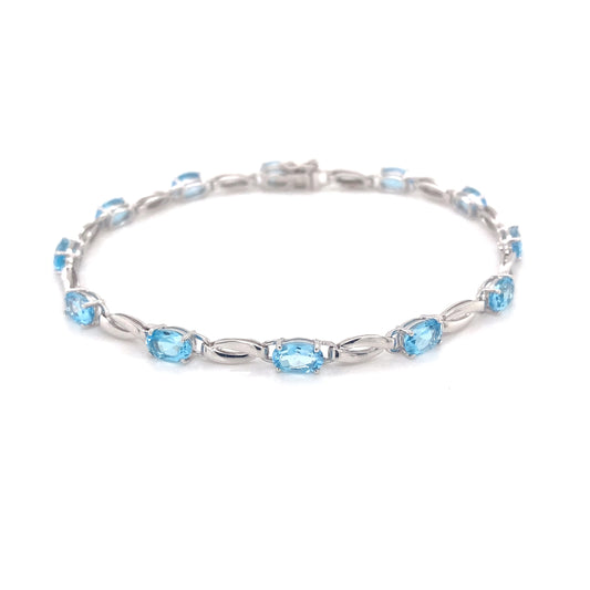 Swiss Blue Topaz and white gold bracelet  Gardiner Brothers   