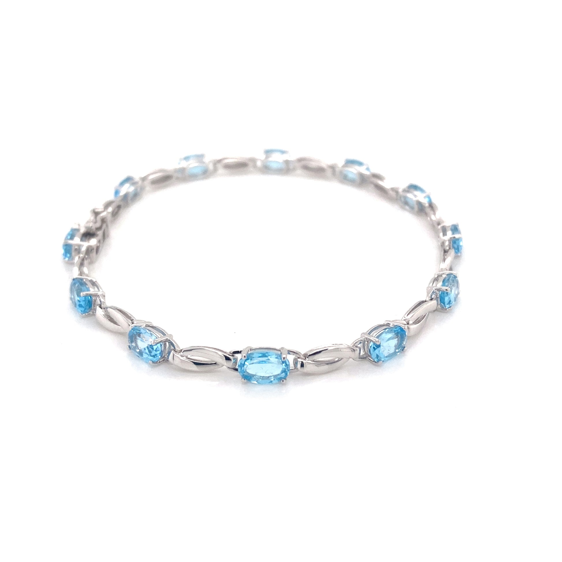 Swiss Blue Topaz and white gold bracelet  Gardiner Brothers   