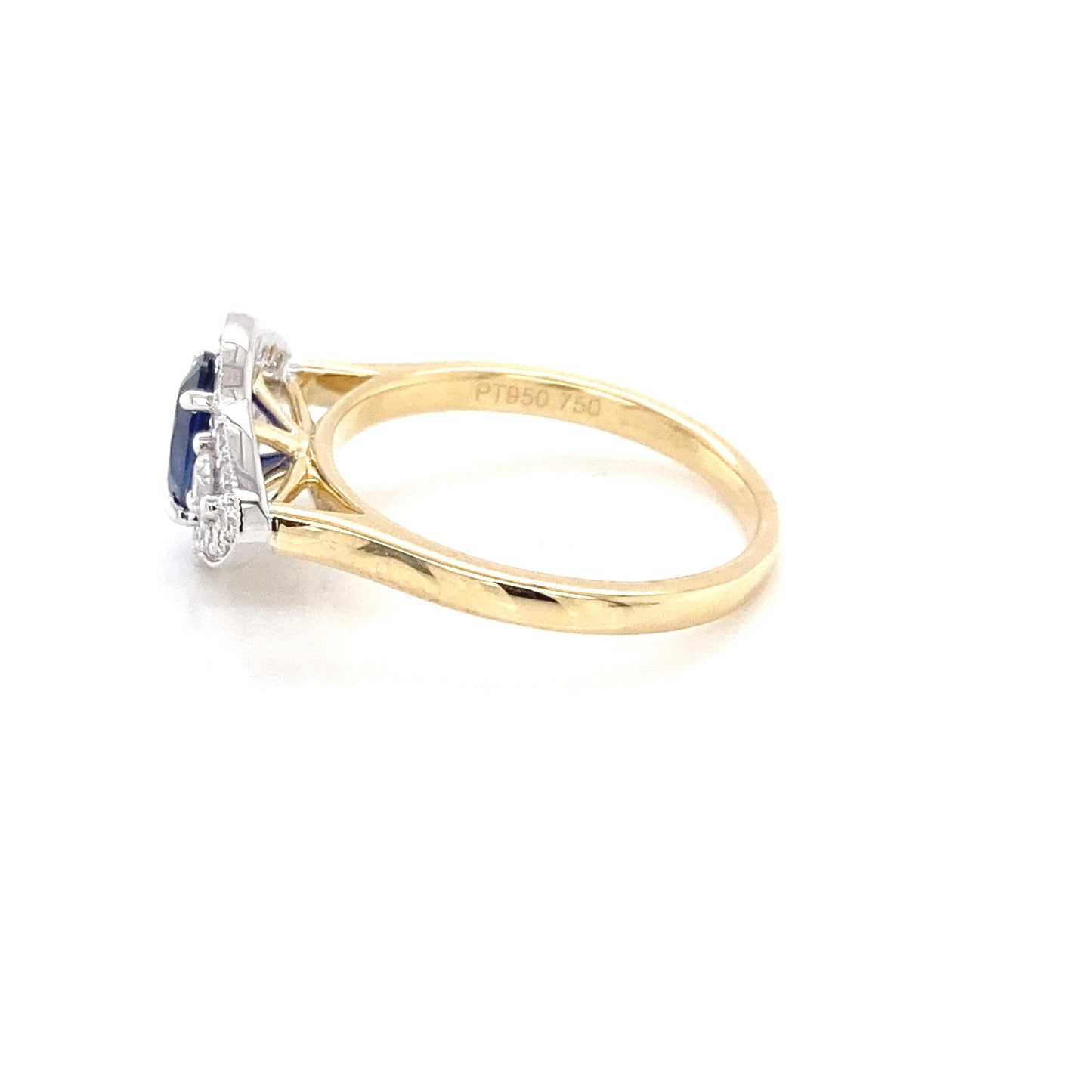 Oval Sapphire and round brilliant cut diamond fancy halo style ring Gardiner Brothers