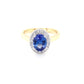 Tanzanite and round brilliant cut diamond halo ring Gardiner Brothers