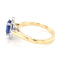 Tanzanite and round brilliant cut diamond halo ring Gardiner Brothers