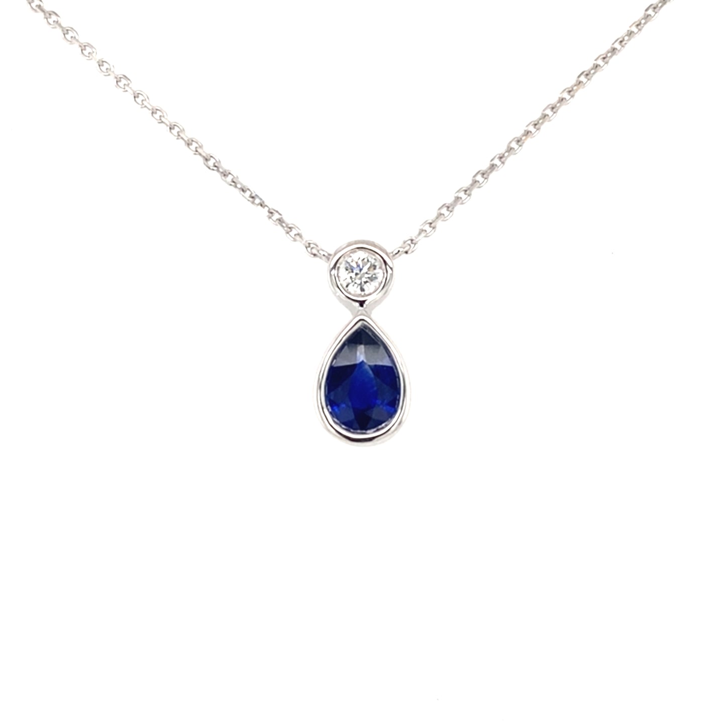 Pear Sapphire and round brilliant cut diamond drop style pendant Gardiner Brothers