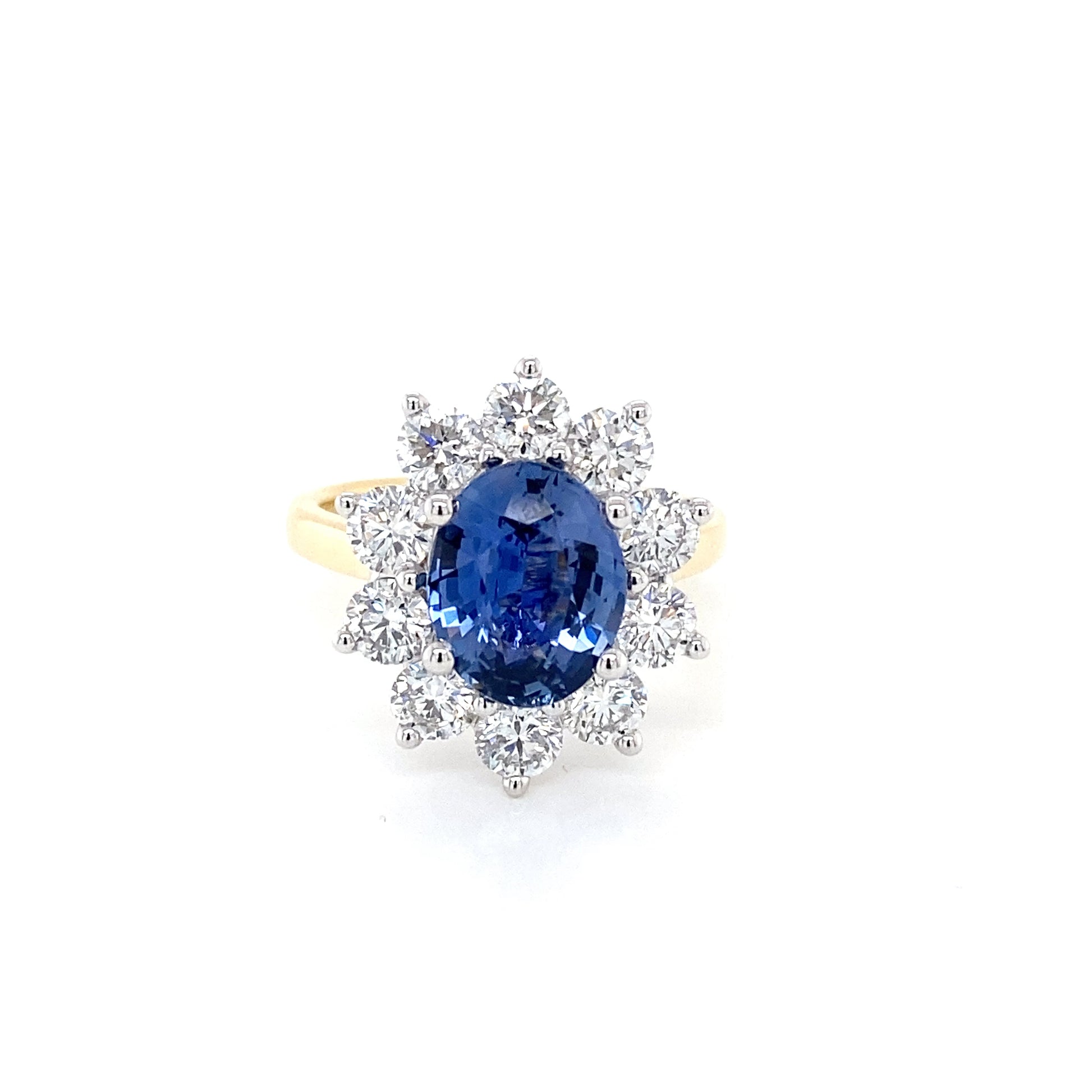 Oval Sapphire and Round Brilliant cut diamond cluster style ring Gardiner Brothers