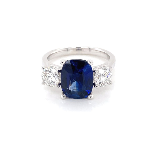 Cushion Shaped Sapphire and round brilliant cut diamond 3 stone ring Gardiner Brothers