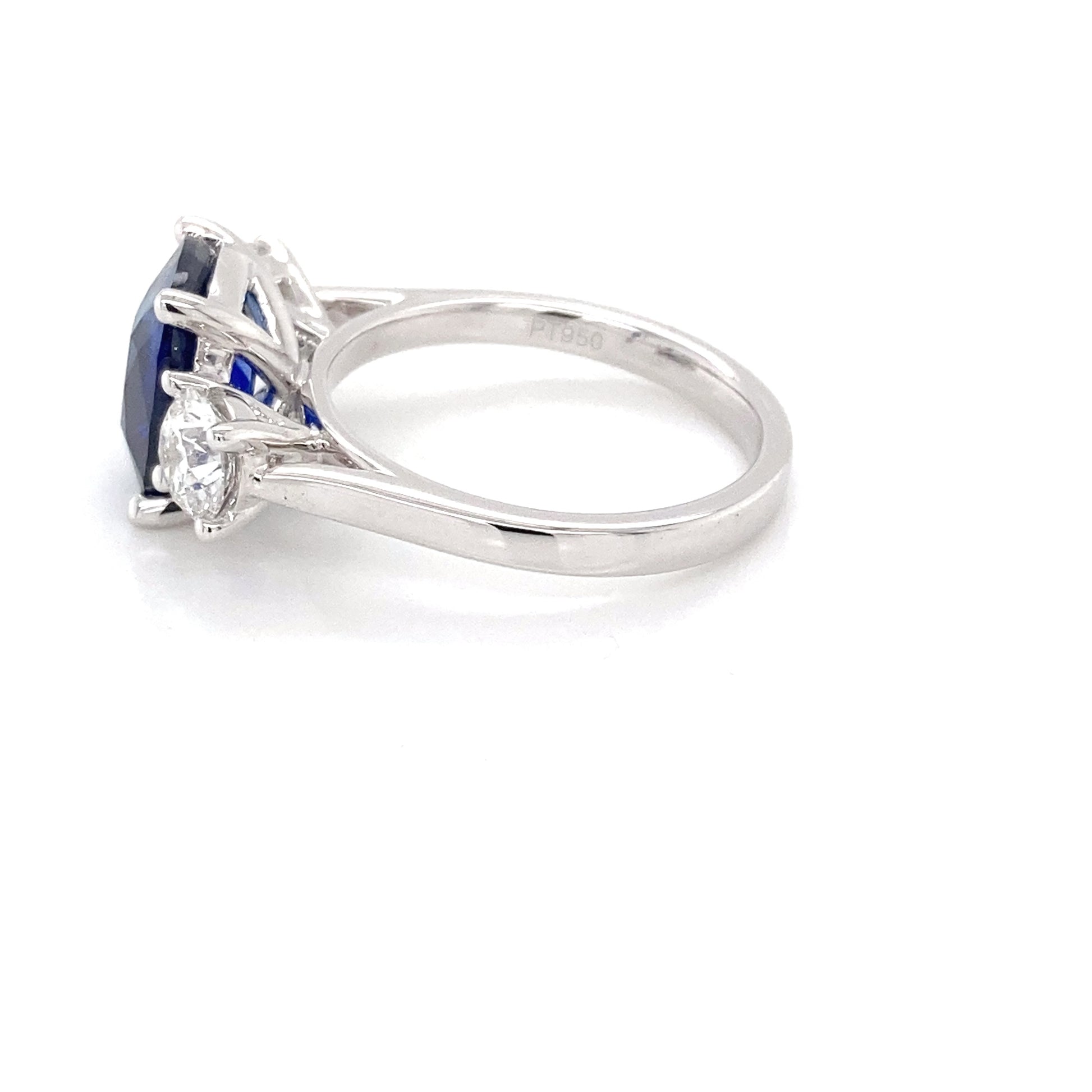 Cushion Shaped Sapphire and round brilliant cut diamond 3 stone ring Gardiner Brothers