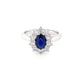 Oval shaped sapphire and round brilliant cut diamond cluster ring Gardiner Brothers