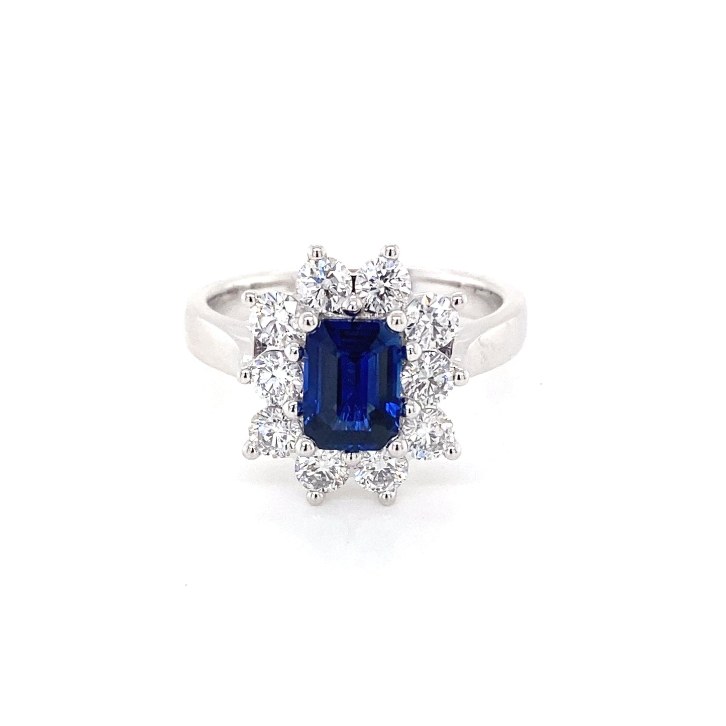 Octagonal Sapphire and round brilliant cut diamond cluster ring Gardiner Brothers