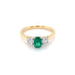 Cushion Shaped emerald and round brilliant cut diamond 3 stone ring Gardiner Brothers