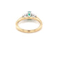 Cushion Shaped emerald and round brilliant cut diamond 3 stone ring Gardiner Brothers