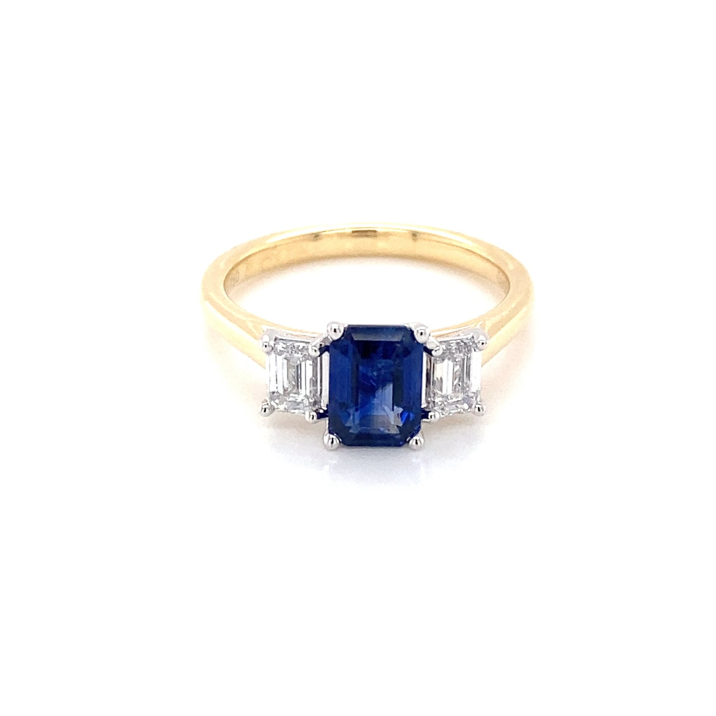 Octagonal shaped sapphire and emerald cut diamond 3 stone ring Gardiner Brothers