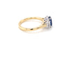 Octagonal shaped sapphire and emerald cut diamond 3 stone ring Gardiner Brothers