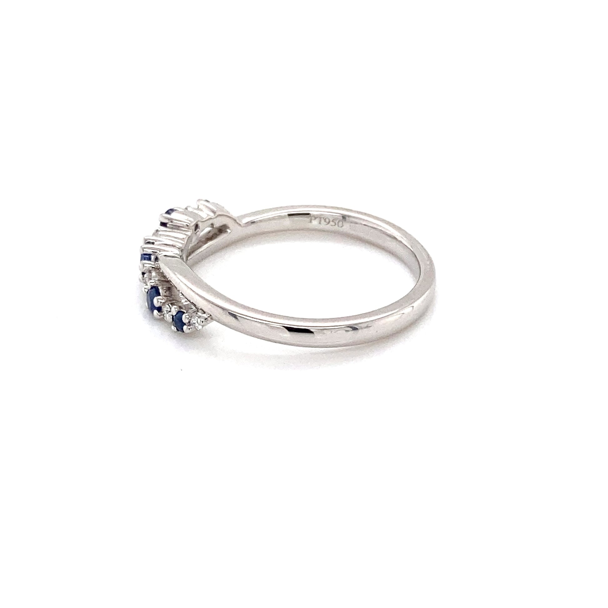 Sapphire and round brilliant cut diamond cross-over style ring Gardiner Brothers