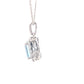 Cushion shaped Aquamarine and round brilliant cut diamond halo pendant Gardiner Brothers
