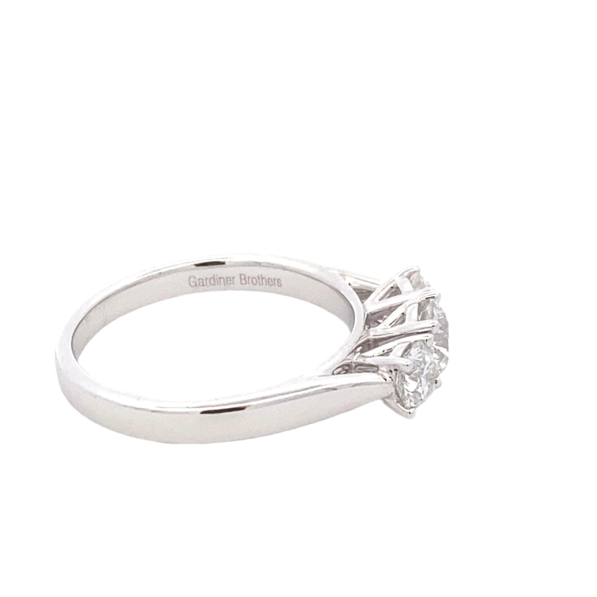 Round brilliant cut diamond 3 stone ring - 0.84cts Gardiner Brothers