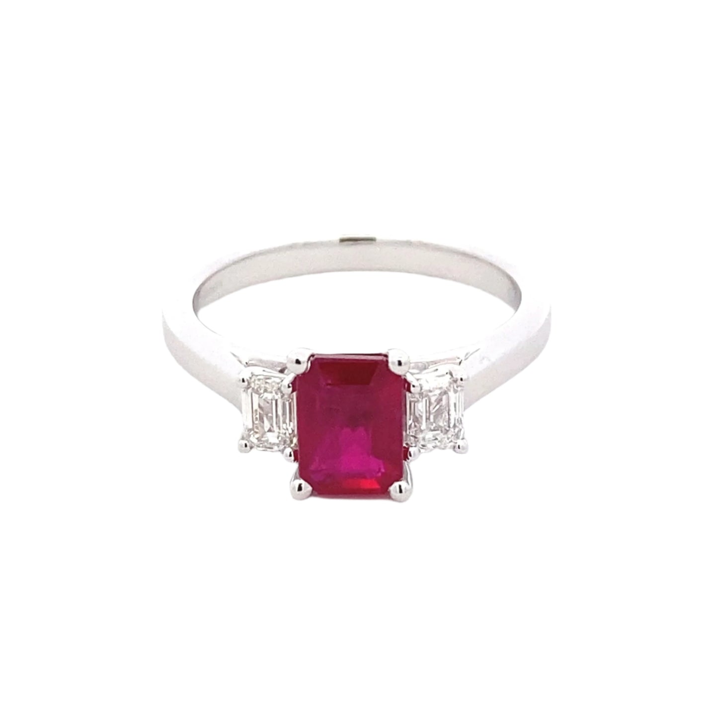 Octagonal shaped Ruby and emerald cut diamond 3 stone ring Gardiner Brothers