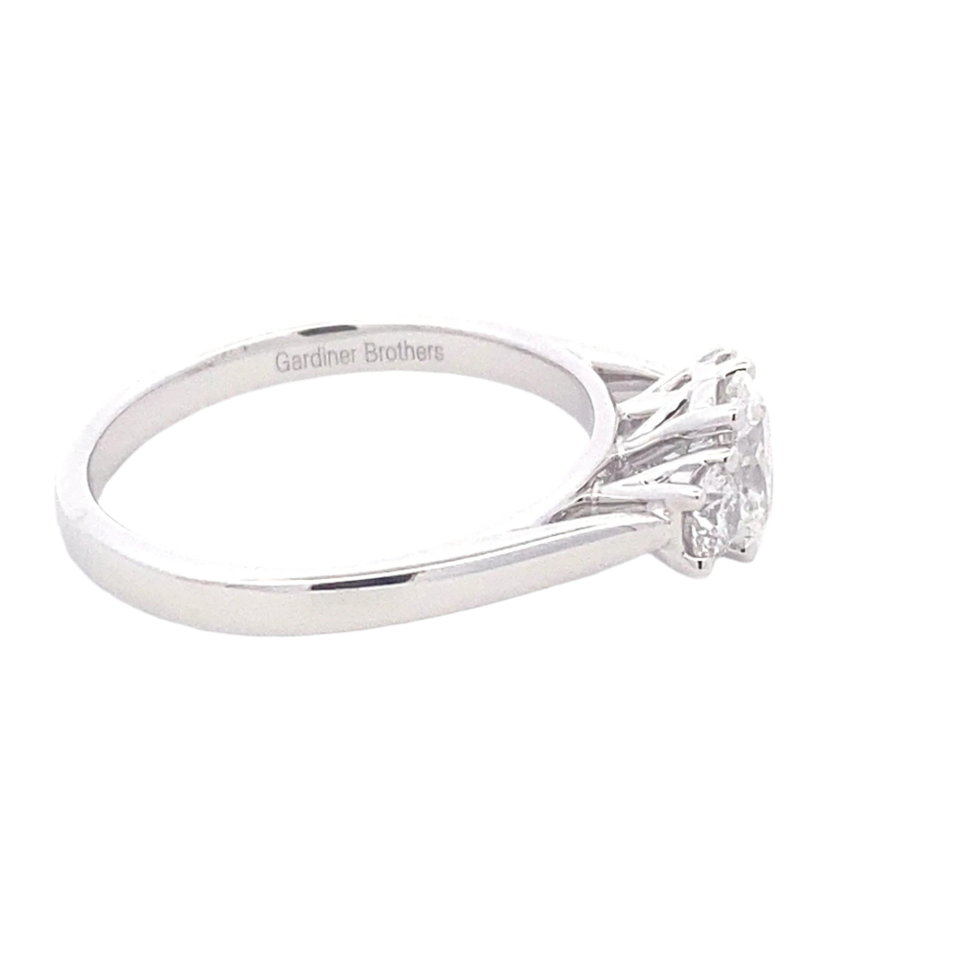 Oval and round brilliant cut diamond 3 stone ring - 0.80cts Gardiner Brothers