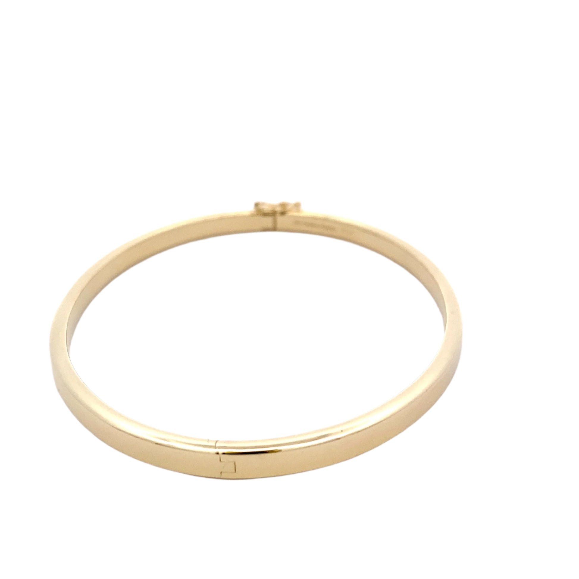 Yellow gold 4mm solid bangle in a flat profile with rounded edges Gardiner Brothers