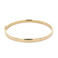 Yellow gold 6mm solid bangle with a court profile Gardiner Brothers