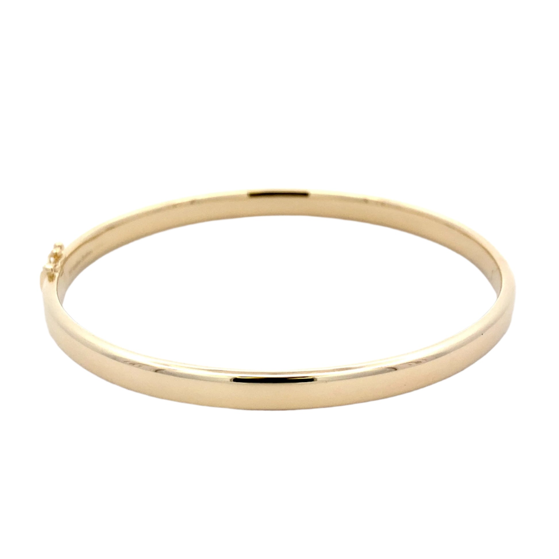 Yellow gold 6mm solid bangle with a court profile Gardiner Brothers