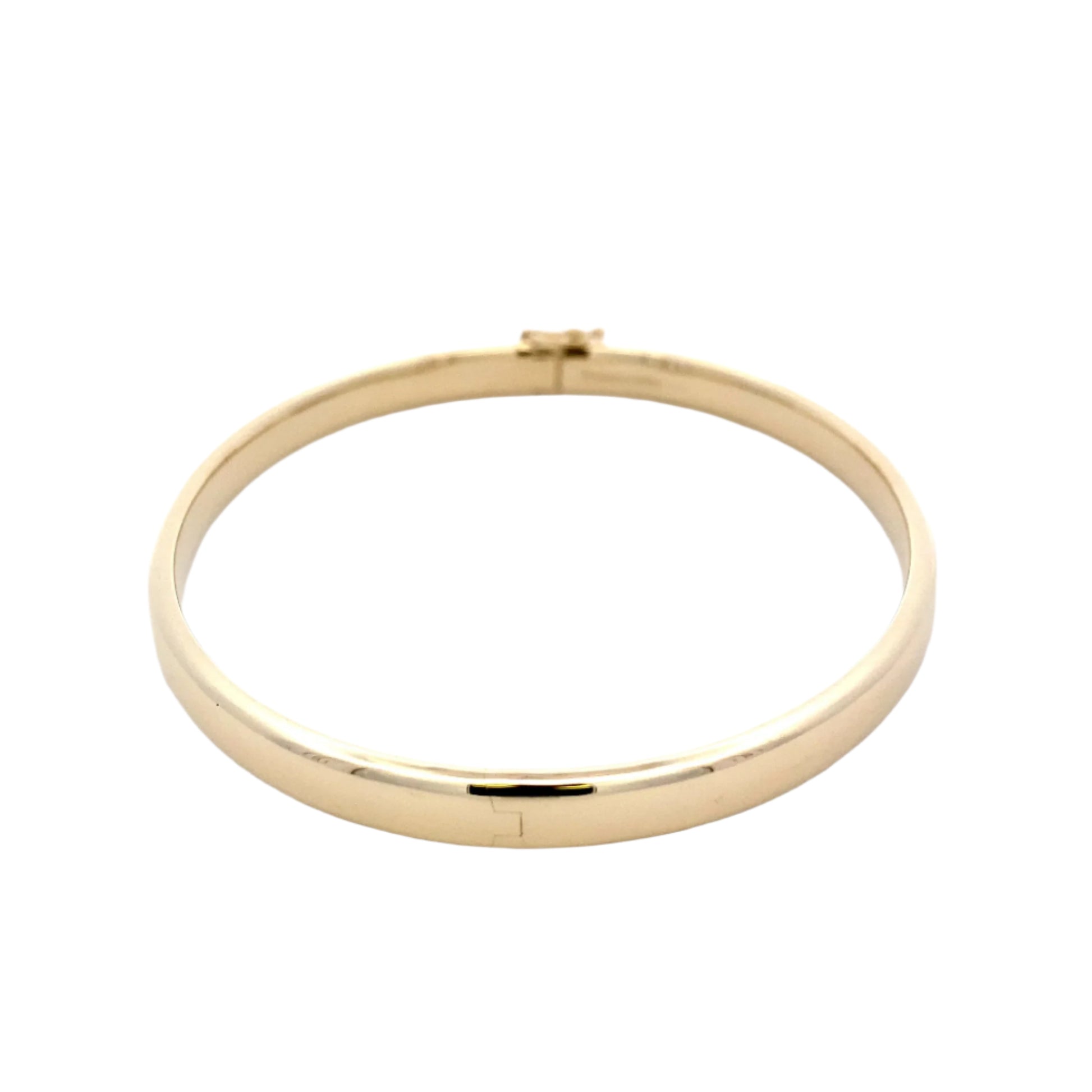 Yellow gold 6mm solid bangle with a court profile Gardiner Brothers