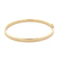 Yellow gold 5mm solid bangle in a flat profile with rounded edges Gardiner Brothers