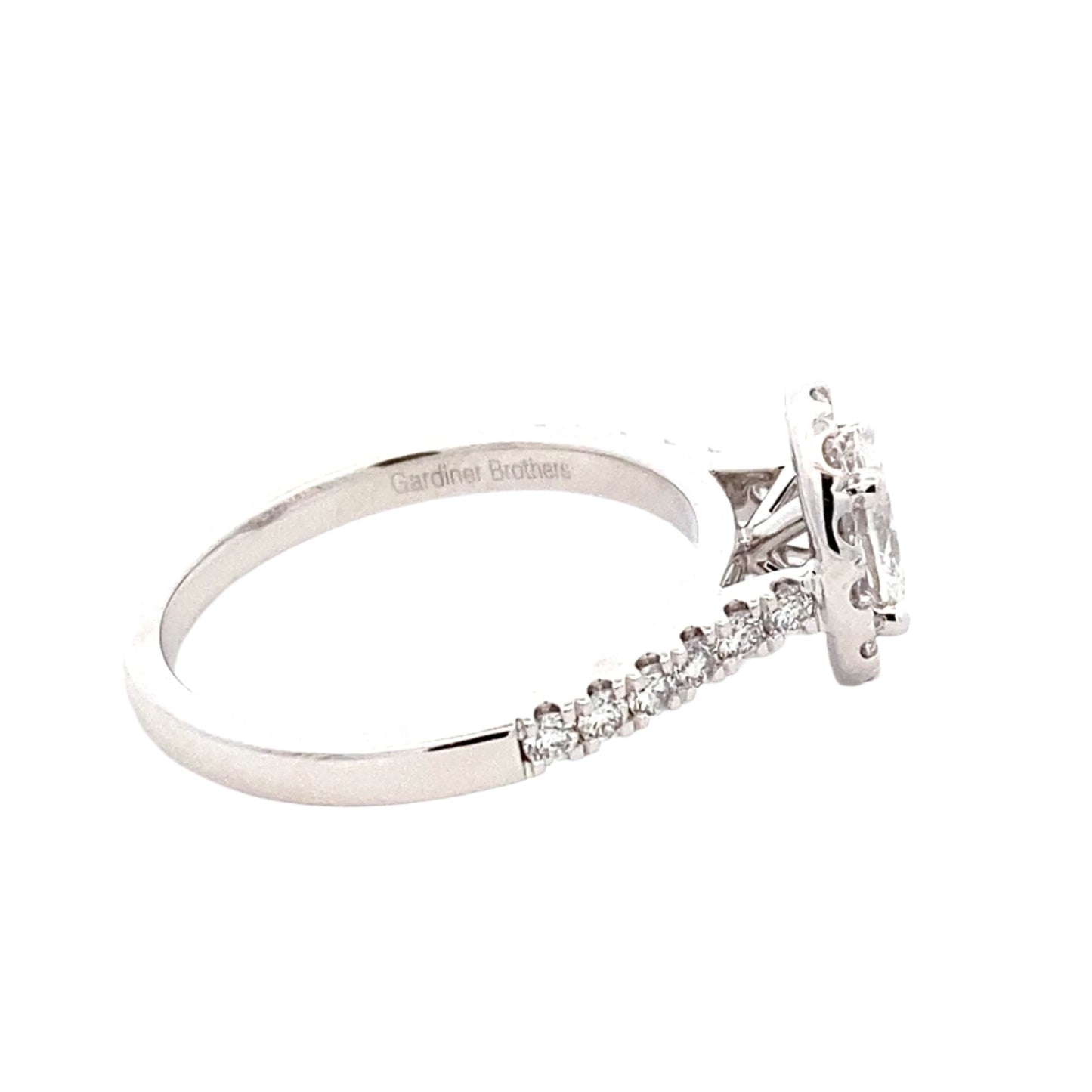 Oval shaped diamond halo cluster style ring - 1.00cts Gardiner Brothers