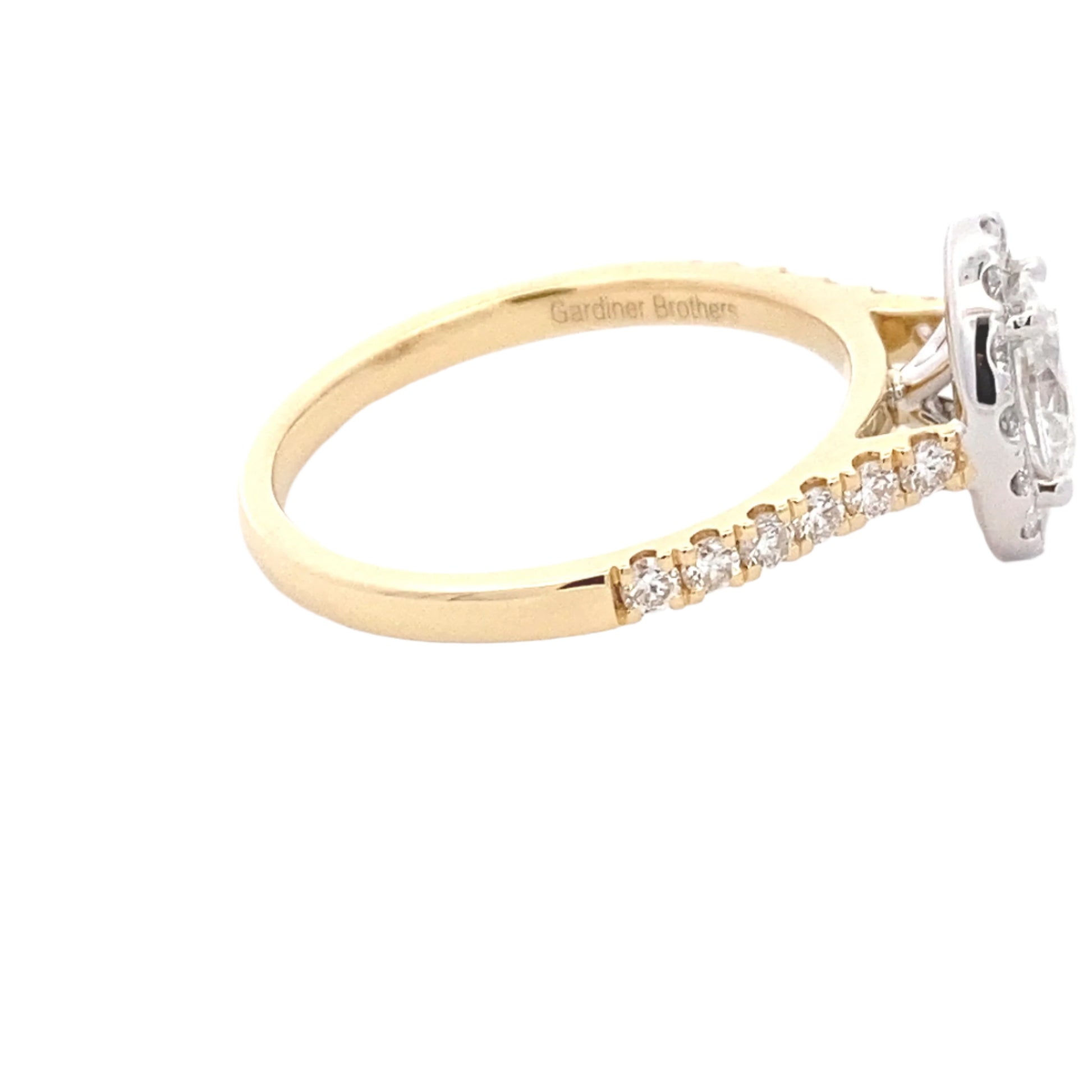 Oval shaped diamond halo cluster style ring - 1.10cts Gardiner Brothers