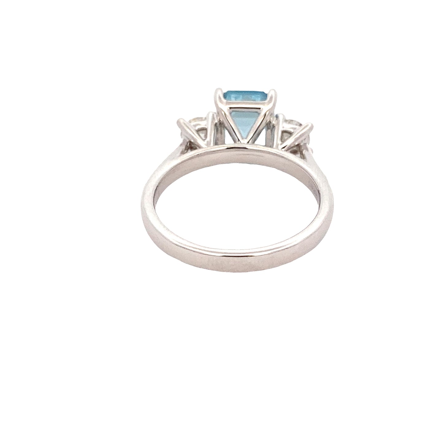 Octagonal Aquamarine and round brilliant cut diamond 3 stone ring Gardiner Brothers
