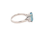 Octagonal Aquamarine and round brilliant cut diamond 3 stone ring Gardiner Brothers