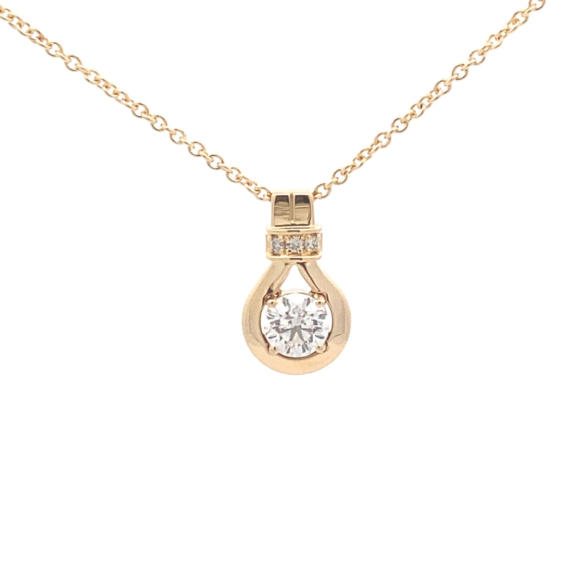 Round Brilliant cut diamond, drop loop style pendant Gardiner Brothers