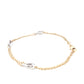 Yellow Gold Chain Bracelet with white gold oval links Gardiner Brothers