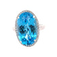 Oval Swiss Blue Topaz and Round Brilliant Cut Diamond Halo Ring Gardiner Brothers