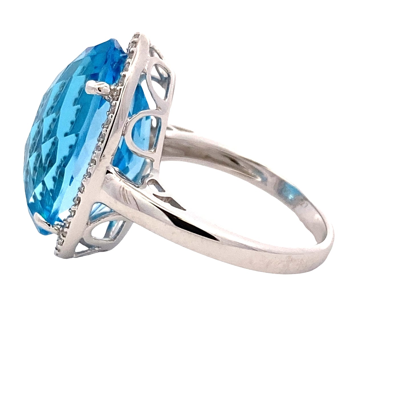 Oval Swiss Blue Topaz and Round Brilliant Cut Diamond Halo Ring Gardiner Brothers