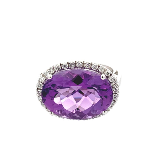 Oval Amethyst and Round Brilliant Cut Diamond Halo Ring Gardiner Brothers
