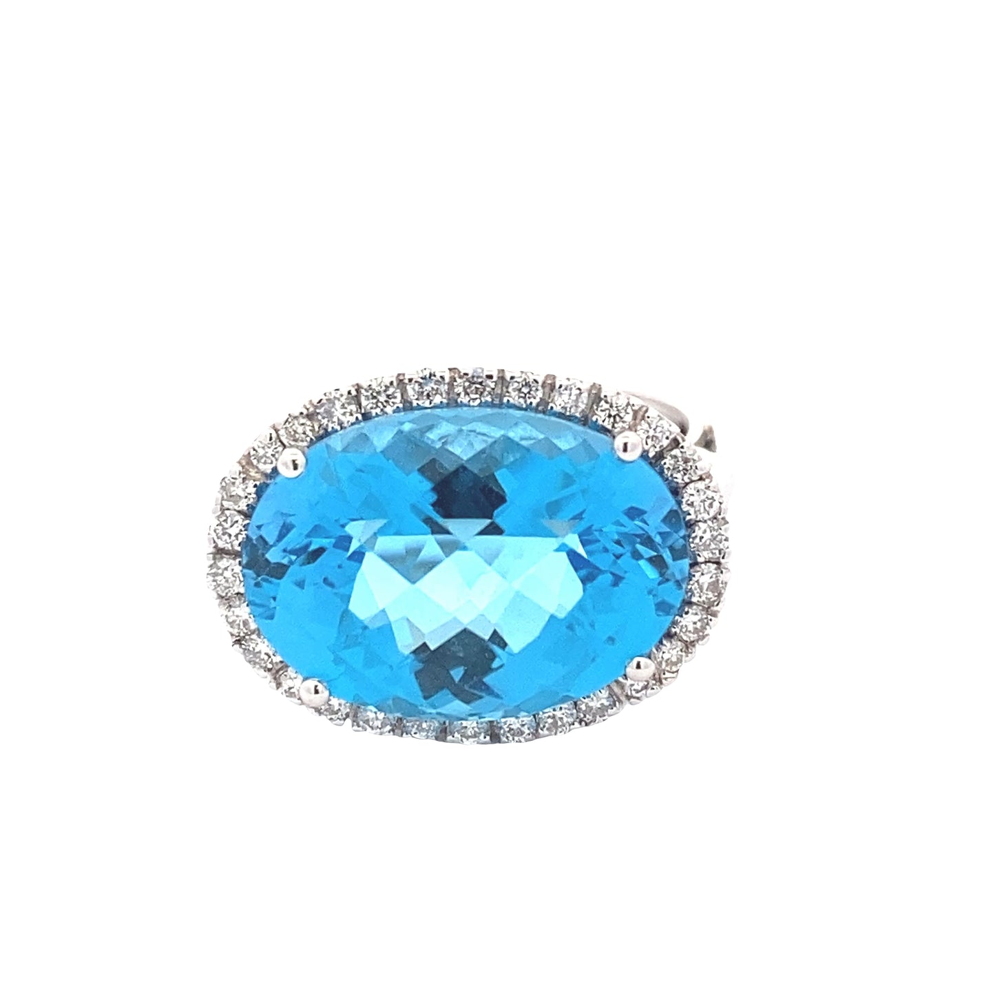 Oval Swiss Blue Topaz and Round Brilliant Cut Diamond Halo Ring Gardiner Brothers