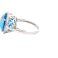 Oval Swiss Blue Topaz and Round Brilliant Cut Diamond Halo Ring Gardiner Brothers