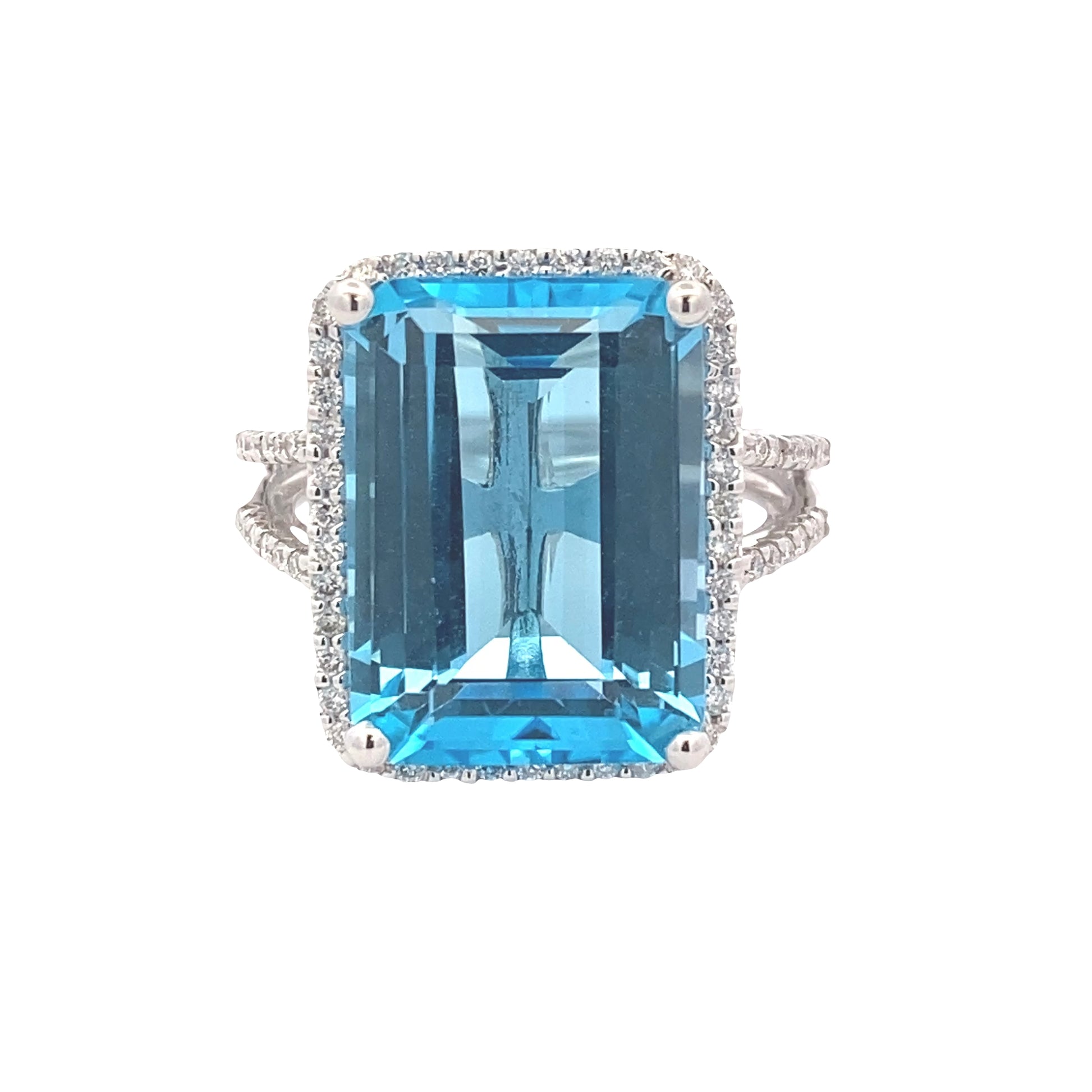 Octagonal Swiss Blue Topaz and Round Brilliant Cut Diamond Halo Ring with Split Diamond Set Shoulders Gardiner Brothers