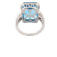 Octagonal Swiss Blue Topaz and Round Brilliant Cut Diamond Halo Ring with Split Diamond Set Shoulders Gardiner Brothers
