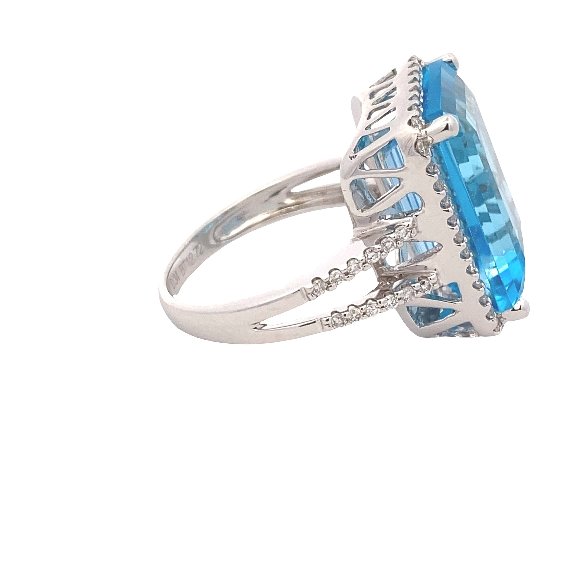 Octagonal Swiss Blue Topaz and Round Brilliant Cut Diamond Halo Ring with Split Diamond Set Shoulders Gardiner Brothers